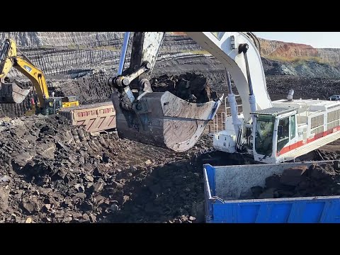 Caterpillar 385C & Caterpillar 365C Excavators Loading Mercedes & MAN Trucks - Interkat SA