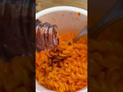 I made microwavable mac & cheese with hot cheetos and hot sauce