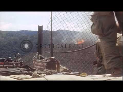 Helicopters take off and artillery set up on Fire Support Base Ripcord, and bombi...HD Stock Footage