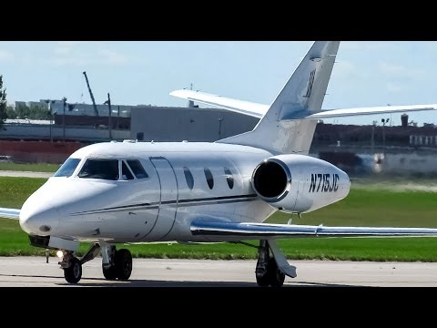 Club Jet Falcon 10 (FA10) landing & close up taxiing in Montreal (YUL)
