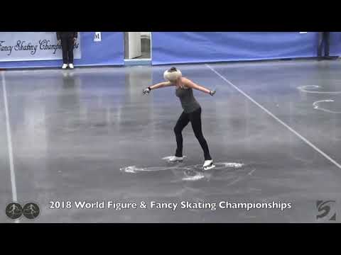B. Pitman & L. Elmore compete the Maltese Cross in the 2018 World Figure Championship