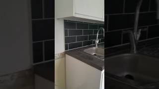 Album cover: "Black Metro Tile" Splashback in Wembley