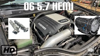 Replacing exhaust manifolds and changing transmission filters on a 06 5.7 Hemi!