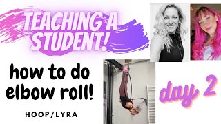 Day two of how to teach a student elbow roll on aerial hoop/Lyra