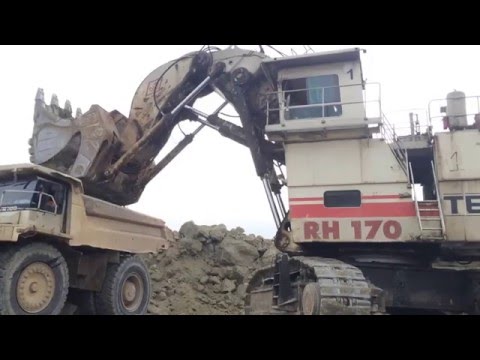 Terex RH170 Shovel Excavator Loading Terex TR100 Dumper
