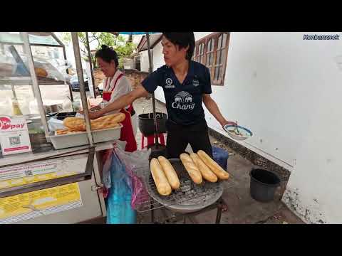 Banh mi sandwich & chicken noodle soup for breakfast in Laos.