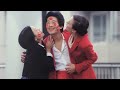 A Woman Wearing Lipstick Kisses A Man All Over His Face Leaving Him Covered In Kiss Marks