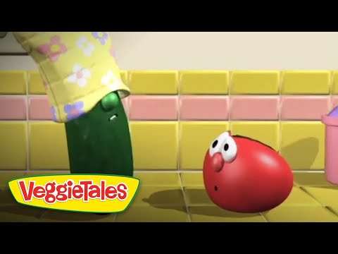 Green pepper character wearing a floral yellow hat leans toward a surprised red tomato in a yellow-tiled kitchen; VeggieTales logo bottom left.