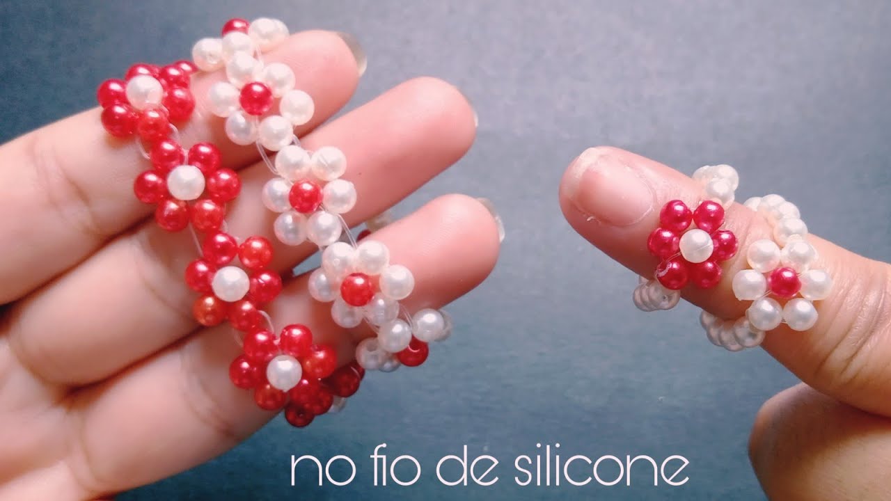 Watch Now Pulseira de pérolas no fio de silicone/passo a passo. Pulseira de pérolas no fio de silicone/passo a passo.