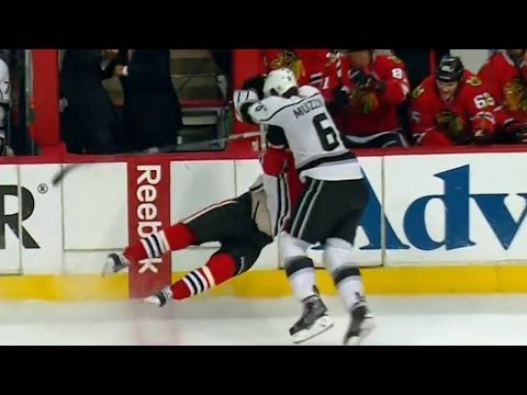 Jake Muzzin whacks Marcus Kruger with huge hit