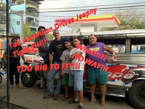 American Driving A Jeepney in the Philippines.