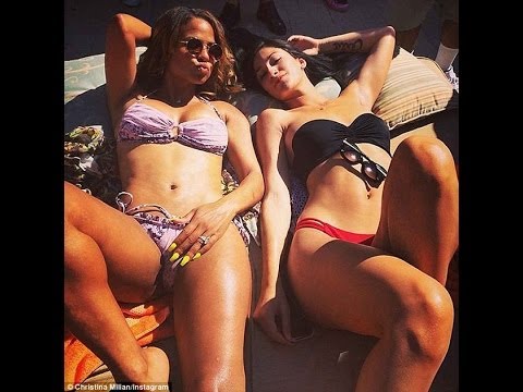 Christina Milian displays toned body poolside in reversible floral bikini while partying in Las Vega