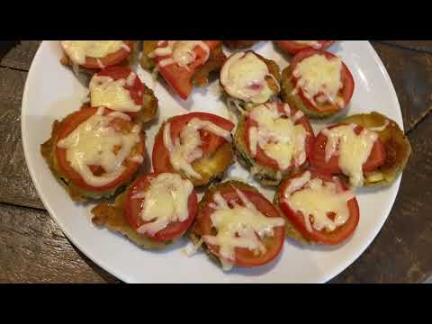 Pan fried courgettes with tomatoes and cheese (Polish cuisine)