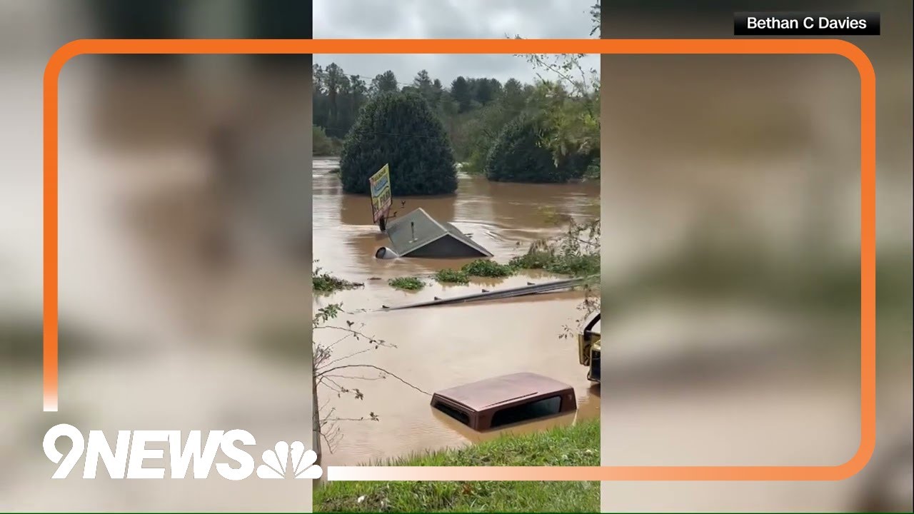 Roof floats by in extreme flooding in Asheville, North Carolina