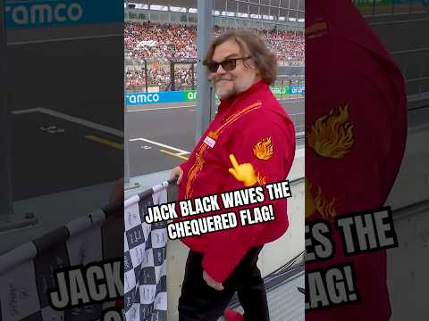 Jack Black Waves Chequered Flag at Japanese GP