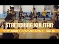Nathan Stretching with the UST Womens Volleyball Team