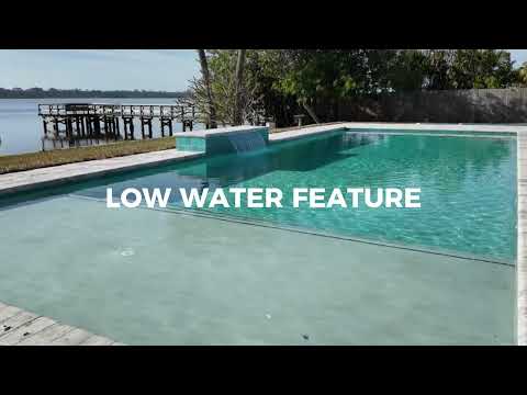 Effortless Beauty – A Simple, Elegant Riverfront Pool by East Coast Pools & Spas