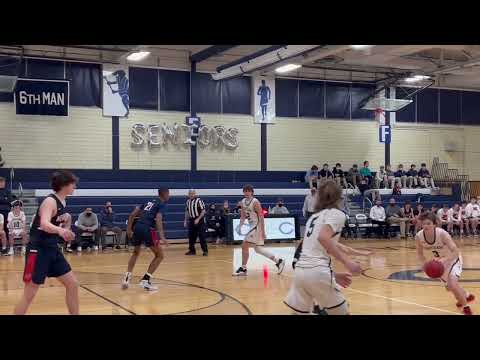 Chatham basketball player Danny Morton grabs his own miss and is fouled