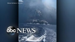 Island volcano of Stromboli erupts right in front of tour boat