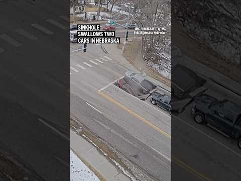 Video Thumbnail: Sinkhole swallows two cars in Nebraska