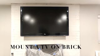 How to Mount a TV onto a Brick Fireplace