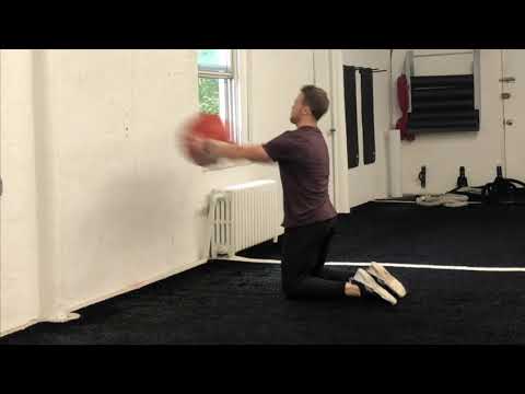 Medicine Ball Kneeling Chest Throw