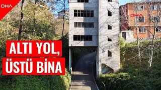 Trabzon'da ilginç yapı. Üstü 4 katlı yapı, altı yol