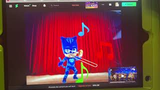 Catboy playing trombone on stage