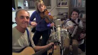 Spill The Whisky barn dance band rehearsing for Scottish weddings and Burn's Night, ceilidhs.