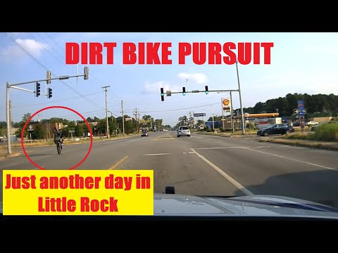 DIRT BIKE does a "wheelie" - Arkansas State Police in pursuit. The operator has different ideas!