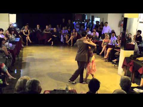  Aurora Lubiz  and  Demián García  are  dancing  to  a  milonga