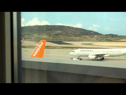 Tráfego do aeroporto Eleftherios Venizelos do restaurante Mcdonalds