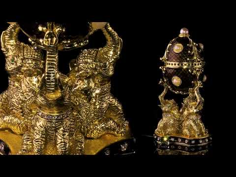 Regal Brown and Gold Enamel Egg with Elephant Pedestal