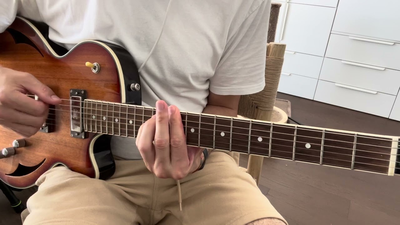 Roberto Barlocci playing the arpeggiated intro riff of U2's "One" on guitar
