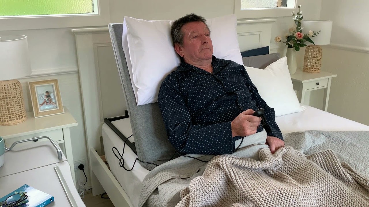 Watch video Deluxe Electrical Adjustable Bed Backrest - Grey! Now Deluxe Electrical Adjustable Bed Backrest - Grey!