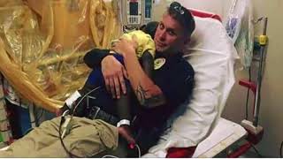 Photo Of Police Officer Cuddling Abandoned Toddler Goes Viral – Look Closer And You Understand Why