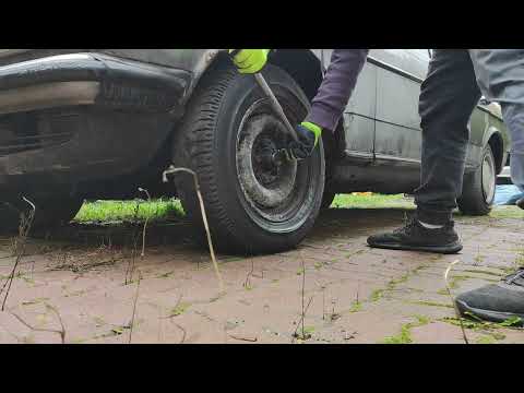 W123 Abandoned in garage for 20 years. Take those wheels off!