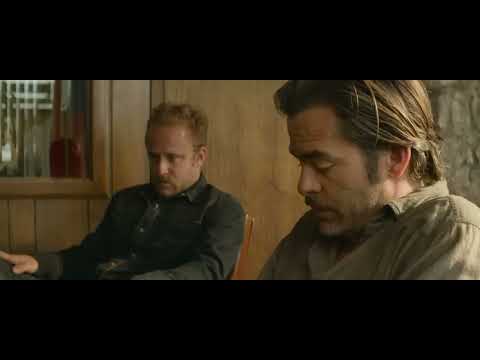 Trailer frame of a quiet porch stare-down that mirrors the film’s hushed final movements
