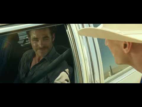 Hell or High Water 2016 official trailer frame of Jeff Bridges and Chris Pine facing the West Texas landscape