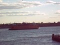 Staten Island Ferry And The Liberty IV Parks Service Leaving Whitehall Terminal In Manhattan