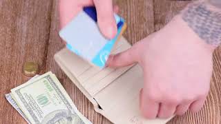 Маленький жіночий гаманець із монетницею з натуральної шкіри KARYA 21377 молочний