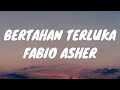 BERTAHAN TERLUKA- FABIO ASHER (LIRIK/LYRICS)