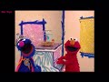 Elmo World Helping