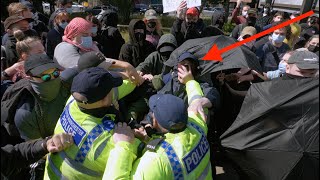 Clashes in Manchester as masked-up counter-protesters try to block Britain First from marching