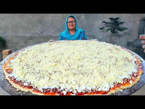 , title : 'DOUBLE CHEESE PIZZA | GIANT PIZZA | PIZZA RECIPE | BIGGEST PIZZA | BY GRANDMA | VEG VILLAGE FOOD'