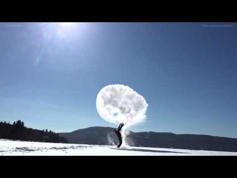 What happens when you throw boiling water into the air in sub-zero temperatures