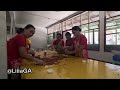 Factory Workers Packing Peanut Brittle