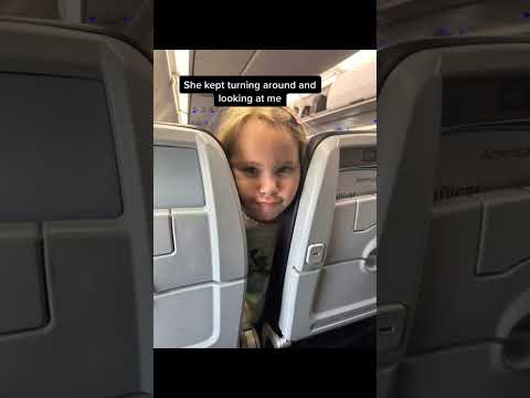Annoying kid on my flight. Yes it's my daughter.