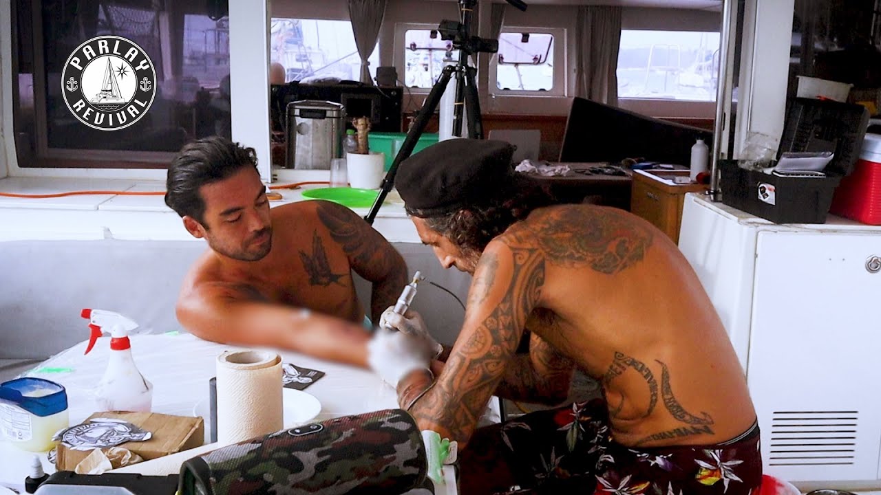 Salvage catamaran turns into Tattoo Parlour!
