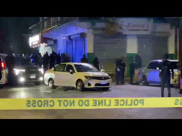Police shot and killed two men in an alleged confrontation and seized a firearm on Manchester Road near Willowgate in Mandeville on Friday.